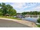 Community boat slips on the lake with a covered gazebo at 286 Glencoe Ln, Mooresville, NC 28117