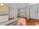 Bright dining room with hardwood floors, built-in shelving, and a decorative ceiling at 286 Glencoe Ln, Mooresville, NC 28117