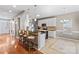 Eat-in kitchen with island, stainless steel appliances, and white cabinets at 286 Glencoe Ln, Mooresville, NC 28117
