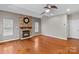 Spacious living room with hardwood floors and a stone fireplace at 286 Glencoe Ln, Mooresville, NC 28117