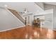 Hardwood floors, open concept kitchen and staircase leading upstairs at 286 Glencoe Ln, Mooresville, NC 28117