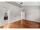 Main bedroom with hardwood floors and ensuite bathroom access at 286 Glencoe Ln, Mooresville, NC 28117