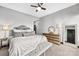 Serene bedroom with a plush bed and elegant gold accents at 435 S Tryon St # 800, Charlotte, NC 28202