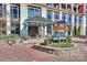 Attractive building entrance with a courtyard and directional signage at 435 S Tryon St # 800, Charlotte, NC 28202