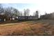 Mobile home on a large lot with mature trees and landscaping at 4223 Old Catawba Rd, Claremont, NC 28610