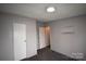 Small bedroom with closet and carpet at 4223 Old Catawba Rd, Claremont, NC 28610