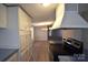 View of kitchen stove and cabinets at 4223 Old Catawba Rd, Claremont, NC 28610