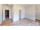 Bright bedroom boasts hardwood floors and neutral walls, showcasing a modern and inviting space at 4223 S New Hope Rd # 8, Cramerton, NC 28032