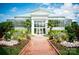 Stunning conservatory building with glass architecture, surrounded by lush gardens at 4223 S New Hope Rd # 8, Cramerton, NC 28032