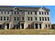 These well-maintained townhomes are designed with varied siding and stylish entryways at 4223 S New Hope Rd # 8, Cramerton, NC 28032