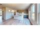 Spacious open-concept kitchen featuring sleek cabinets, an island with sink, and natural light streaming through the window at 4223 S New Hope Rd # 8, Cramerton, NC 28032