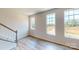 Open-concept space with hardwood floors and plenty of natural light, perfect for entertaining or relaxing with Gathering at 4223 S New Hope Rd # 8, Cramerton, NC 28032