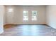 Bright living room with hardwood floors and bright natural light at 4223 S New Hope Rd # 8, Cramerton, NC 28032