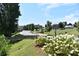 Scenic view of park featuring sidewalks, gazebo, landscaping, and surrounding buildings at 4223 S New Hope Rd # 8, Cramerton, NC 28032