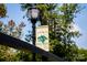 Welcome sign for Goat Island in Cramerton, NC, attached to a decorative lamp post at 4223 S New Hope Rd # 8, Cramerton, NC 28032
