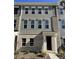 View of the entrance to the townhome with brick and siding exterior at 4225 S New Hope Rd # 9, Cramerton, NC 28032