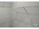 Bright walk-in closet with white wire shelving providing ample storage space at 4225 S New Hope Rd # 9, Cramerton, NC 28032