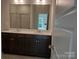 Bathroom with double vanity, sleek fixtures, and a large mirror reflecting a well-lit space at 4229 S New Hope Rd # 11, Cramerton, NC 28032