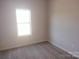 Bedroom with carpet, one window letting in ample natural light, and neutral walls at 4229 S New Hope Rd # 11, Cramerton, NC 28032
