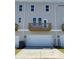 Two-story townhome with a garage, balcony, and neutral siding, perfect for modern living at 4229 S New Hope Rd # 11, Cramerton, NC 28032