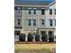View of new townhomes showing varied facade colors and professional landscaping at 4229 S New Hope Rd # 11, Cramerton, NC 28032