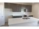 New kitchen with white countertops, stainless steel sink, and gray cabinets at 4229 S New Hope Rd # 11, Cramerton, NC 28032