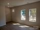 Bright living room with natural light, light wood flooring, and neutral paint at 4229 S New Hope Rd # 11, Cramerton, NC 28032