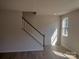 Living room with staircase, natural light, and wood flooring at 4229 S New Hope Rd # 11, Cramerton, NC 28032