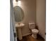 Half bathroom with white pedestal sink and toilet at 4229 S New Hope Rd # 11, Cramerton, NC 28032