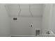 Utility room with hookups, storage, and a clean, functional design at 4229 S New Hope Rd # 11, Cramerton, NC 28032