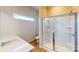 Well-appointed bathroom features a glass-enclosed shower, vanity, and contemporary fixtures at 4227 S New Hope Rd # 10, Cramerton, NC 28032