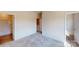 Spacious bedroom with neutral carpet, adjacent bathroom and closet, offering comfort and convenience at 4227 S New Hope Rd # 10, Cramerton, NC 28032
