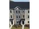 Two-story townhome with gray siding and brick accents. Dark roof. Three units are shown with sidewalks and yard space at 4227 S New Hope Rd # 10, Cramerton, NC 28032