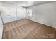 Bedroom with carpeted floors, a window for natural light, and closet space for storage at 1006 Wilson Blvd, Dallas, NC 28034