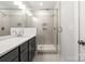 Contemporary bathroom with sleek vanity and glass-enclosed shower at 413 Prine Pl # Brx0014, Charlotte, NC 28213