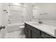 Well-lit bathroom with a tub-shower combination and vanity at 413 Prine Pl # Brx0014, Charlotte, NC 28213