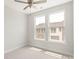 Bright bedroom with two windows at 413 Prine Pl # Brx0014, Charlotte, NC 28213