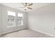 Cozy bedroom featuring a ceiling fan and two bright windows at 413 Prine Pl # Brx0014, Charlotte, NC 28213