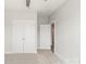 Bright bedroom with plush carpet and access to storage space at 413 Prine Pl # Brx0014, Charlotte, NC 28213