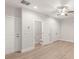 Spacious bedroom with ceiling fan, wood-look floors and access to ensuite bathroom and closet at 413 Prine Pl # Brx0014, Charlotte, NC 28213