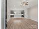 Open floor plan showcases the kitchen with center island at 413 Prine Pl # Brx0014, Charlotte, NC 28213