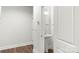 Bathroom with pedestal sink, wood floors, recessed lighting, and gray walls at 417 Prine Pl # Brx0013, Charlotte, NC 28213