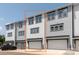 New construction townhome with light gray siding and dark trim at 417 Prine Pl # Brx0013, Charlotte, NC 28213