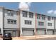New construction townhome featuring a one car garage and neutral gray and white color scheme at 417 Prine Pl # Brx0013, Charlotte, NC 28213