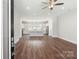 Open-concept living room and kitchen showcasing modern design and ample natural light at 417 Prine Pl # Brx0013, Charlotte, NC 28213