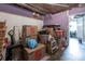 Unfinished basement shows storage with boxes, a cart, and exposed ceiling structures at 166 Rosalind Ln, Statesville, NC 28677