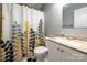 Cozy bathroom with a tub, a charming curtain, and a granite countertop with sink at 166 Rosalind Ln, Statesville, NC 28677