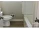 Clean bathroom with a bathtub and neutral color scheme at 431 E 12Th Ave, Gastonia, NC 28054