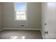 Well-lit bedroom with neutral wall paint and carpeted floors at 431 E 12Th Ave, Gastonia, NC 28054