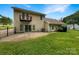 Spacious backyard featuring a patio, a balcony, and mature trees at 7210 Morningdew Ct, Denver, NC 28037